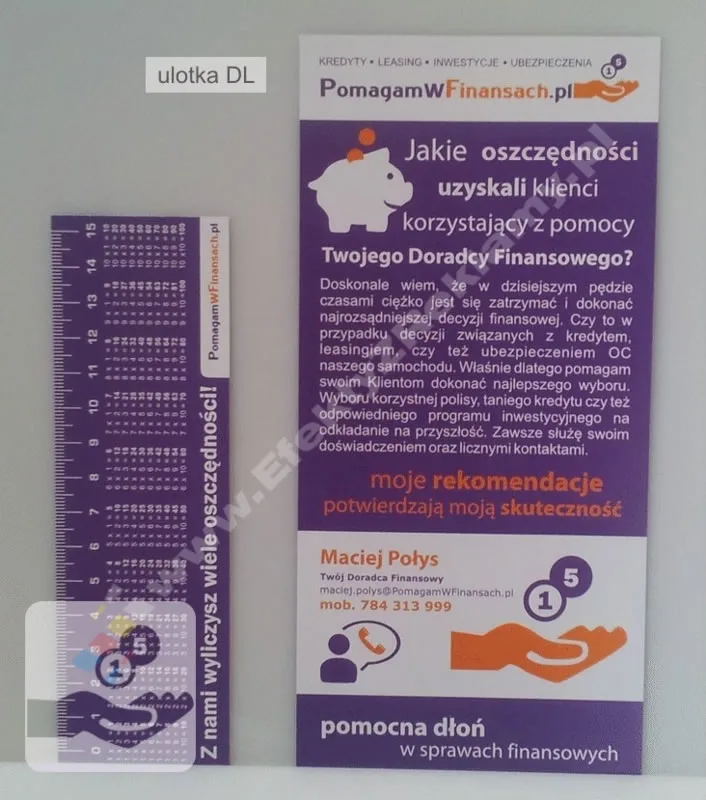 ulotka DL na tle zakładki do książki